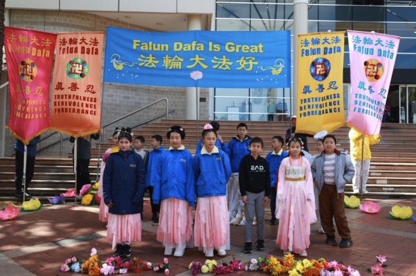 Attendees at the Falun Dafa booth, Dandenong Square