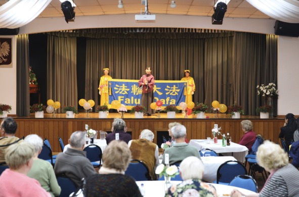 Audience members enjoying the solo vocal performance